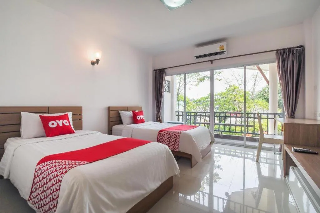 Bed in Super OYO 662 Malee Bunga Hotel