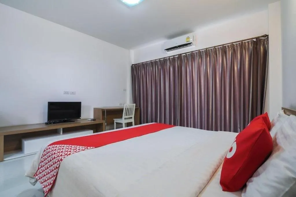 Bed in Super OYO 662 Malee Bunga Hotel