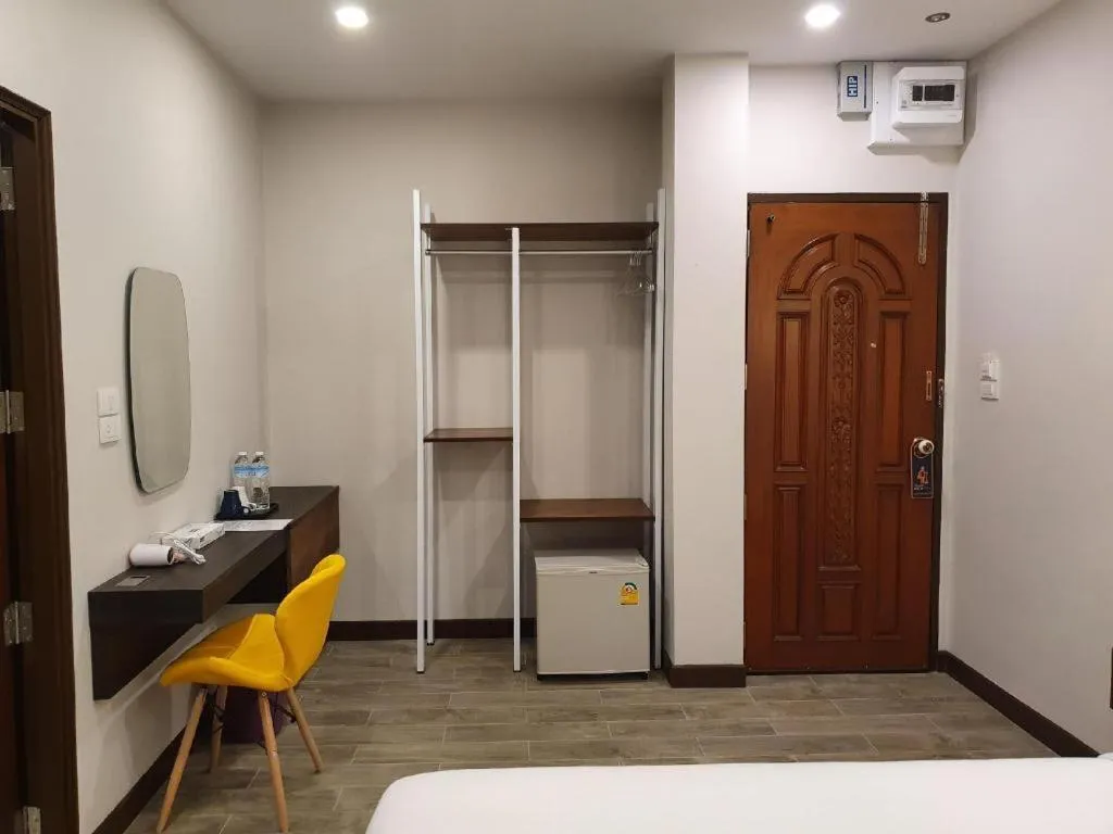 Bed in THE S VILLAS HOTEL