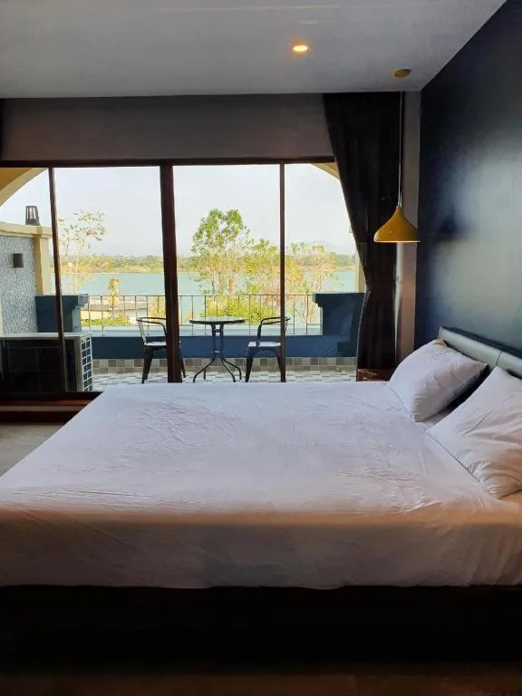 Bed in THE S VILLAS HOTEL