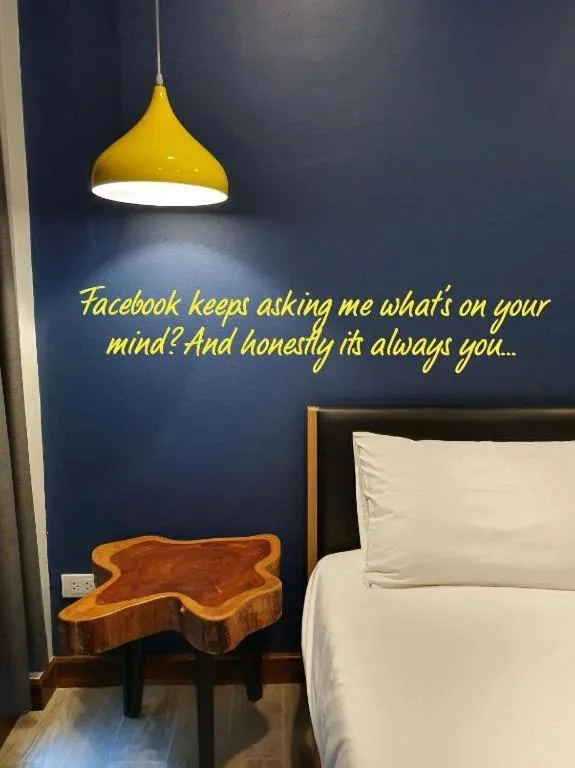 Bed in THE S VILLAS HOTEL