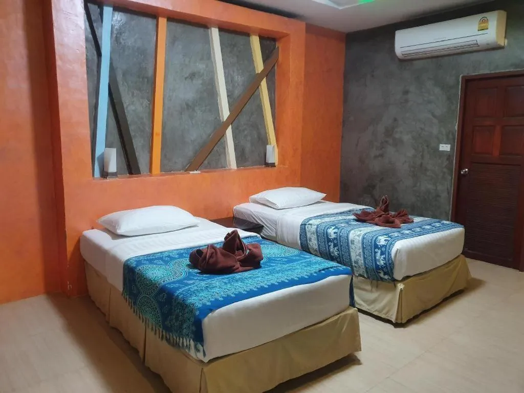 Bed in Saikaew Boutique Hotel