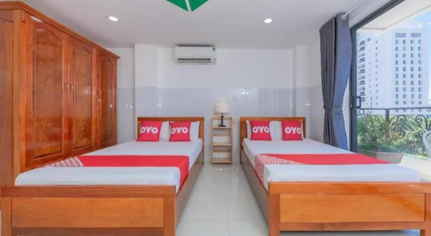Bed in OYO 1028 Flower House Apartment
