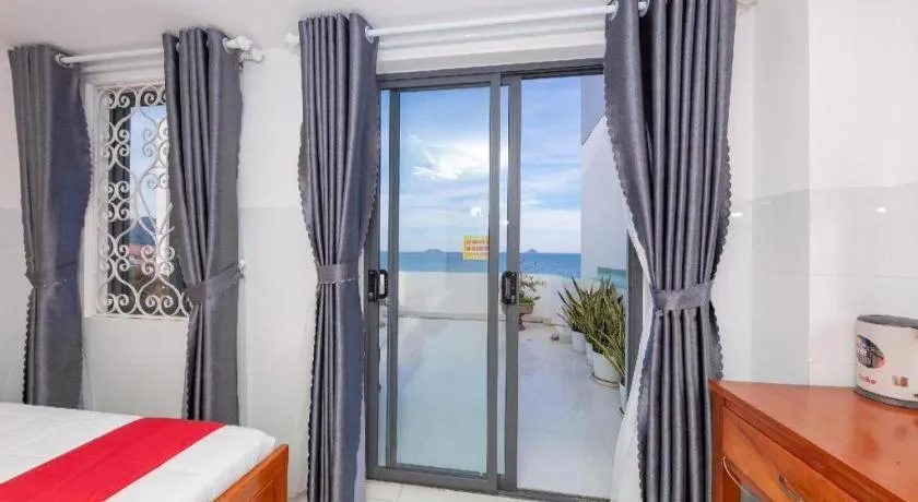 Bed in OYO 1028 Flower House Apartment