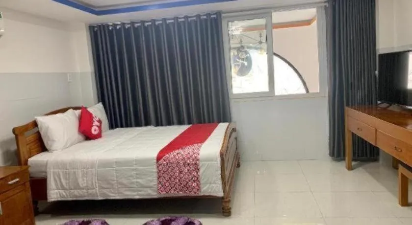 Bed in OYO 1028 Flower House Apartment