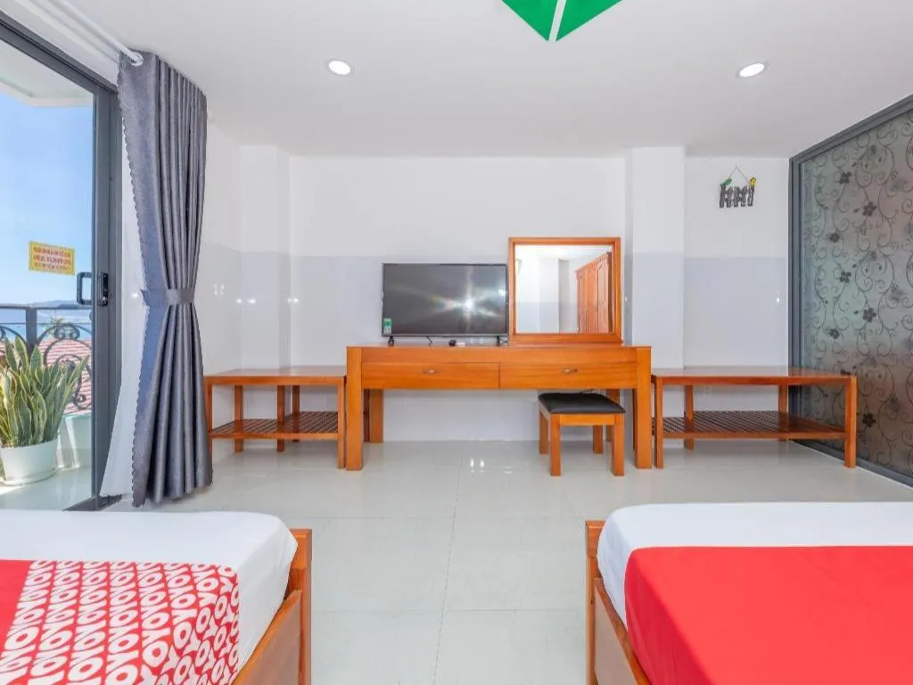 Bed in OYO 1028 Flower House Apartment