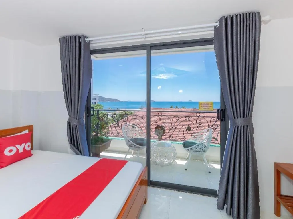 Bed in OYO 1028 Flower House Apartment