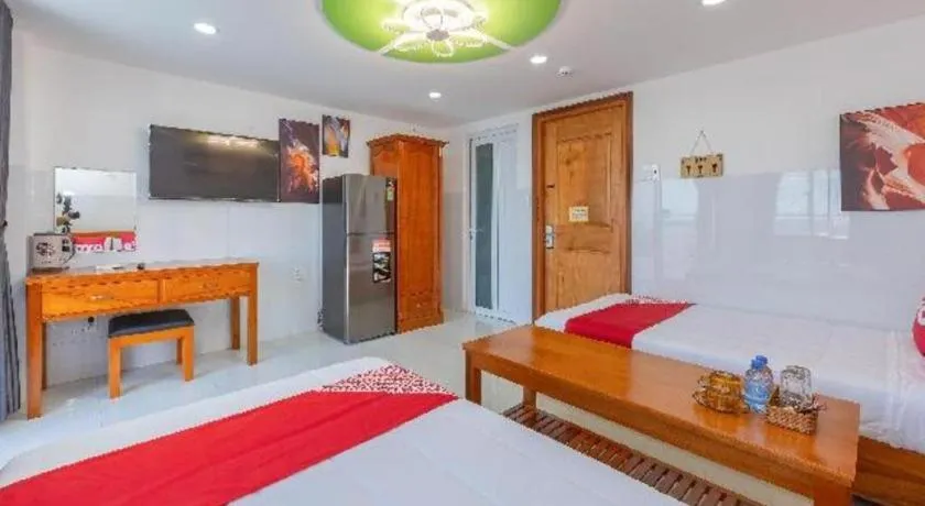 Bed in OYO 1028 Flower House Apartment