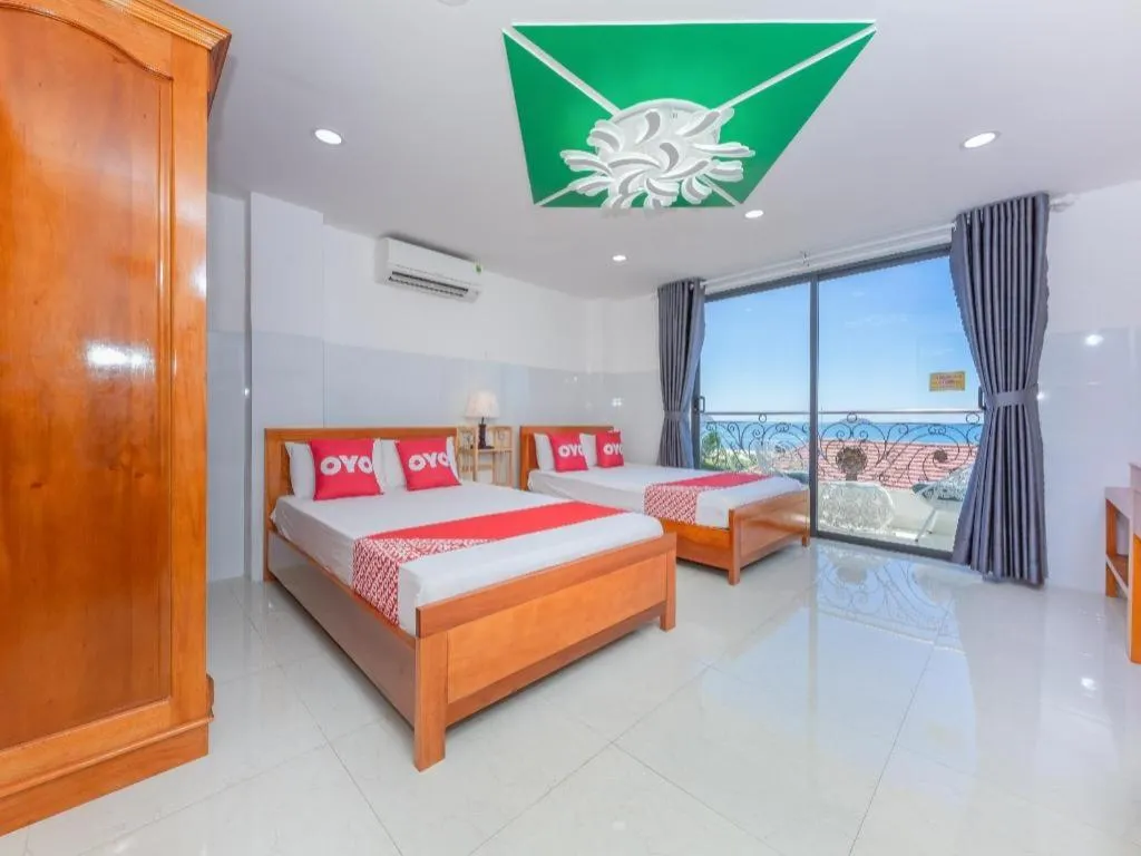 Bed in OYO 1028 Flower House Apartment