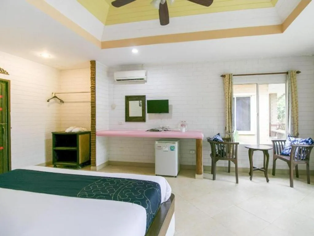 Bed in CAPITAL O961 Baan Dow Chompoo Resort