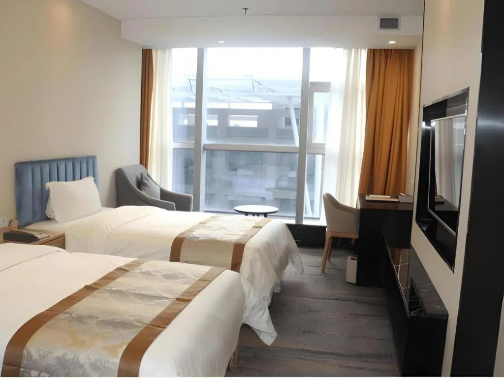 Bed in Golden Central Hotel Shenzhen