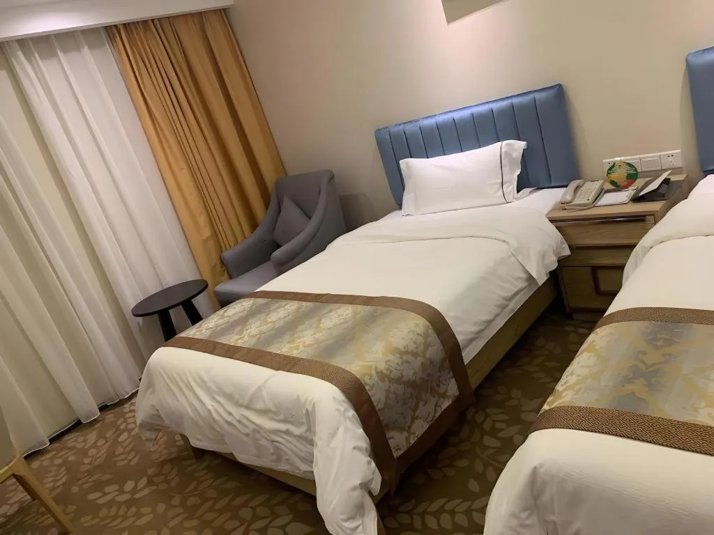 Bed in Golden Central Hotel Shenzhen