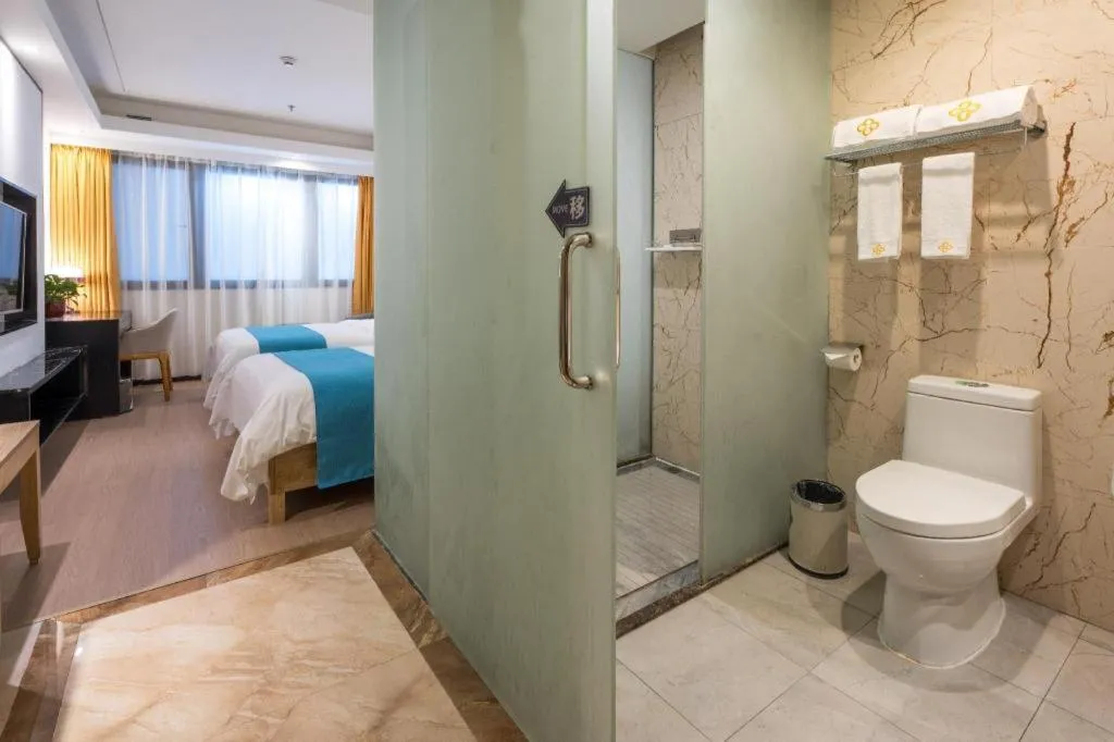 Bed in Golden Central Hotel Shenzhen