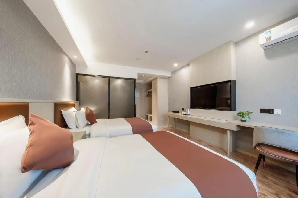 Bed in Gya Hotel Shanghai Long Distance Passenger Terminal Station