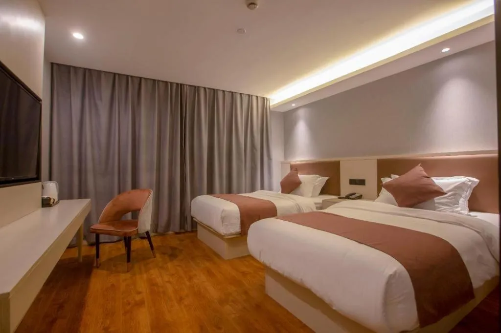 Bed in Gya Hotel Shanghai Long Distance Passenger Terminal Station