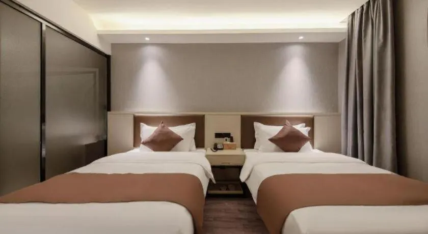 Bed in Gya Hotel Shanghai Long Distance Passenger Terminal Station