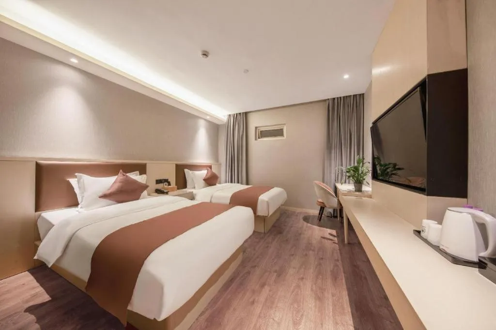 Bed in Gya Hotel Shanghai Long Distance Passenger Terminal Station