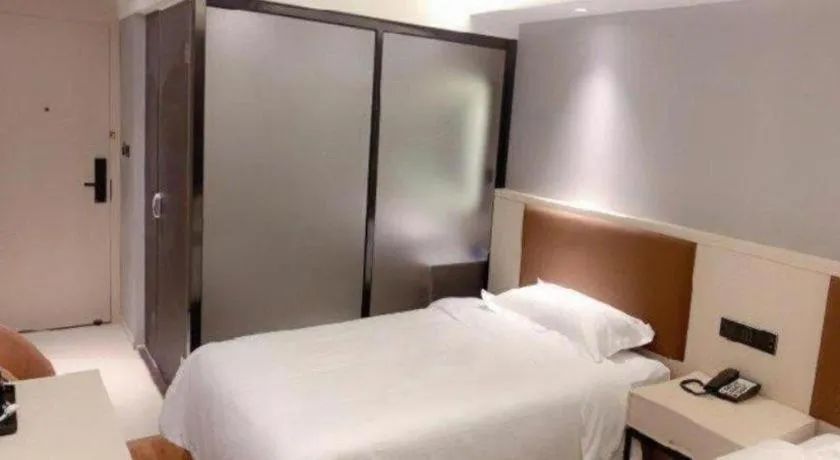 Bed in Gya Hotel Shanghai Long Distance Passenger Terminal Station