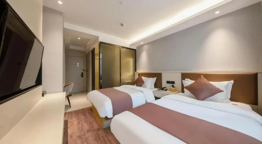 Bed in Gya Hotel Shanghai Long Distance Passenger Terminal Station