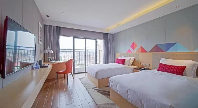 Bed in Borrman Hotel Zhaoqing Sihui Tianguangxu Jade City