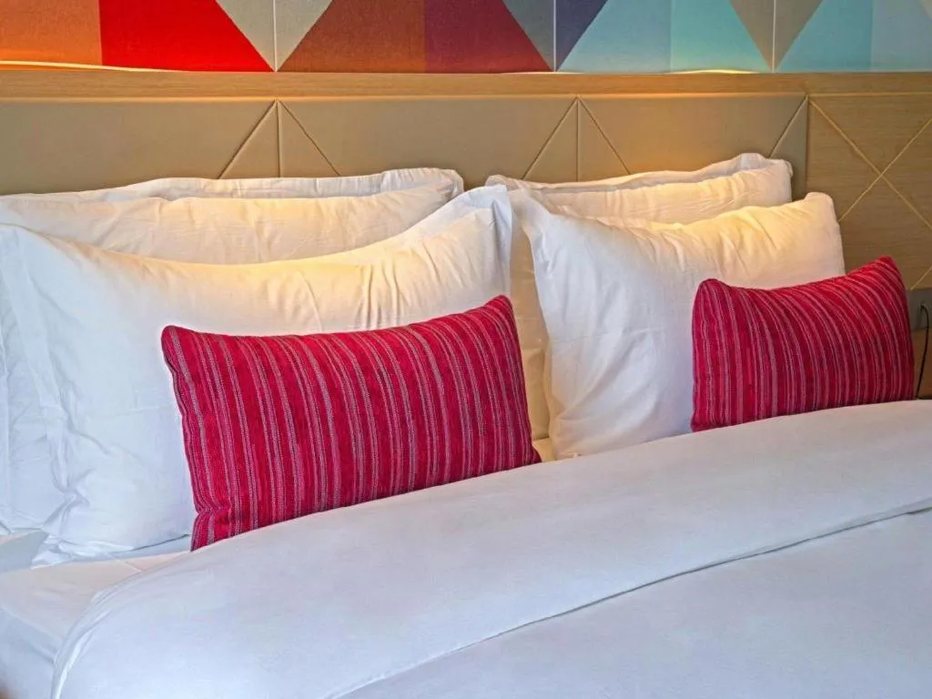 Bed in Borrman Hotel Zhaoqing Sihui Tianguangxu Jade City