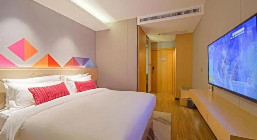 Bed in Borrman Hotel Zhaoqing Sihui Tianguangxu Jade City