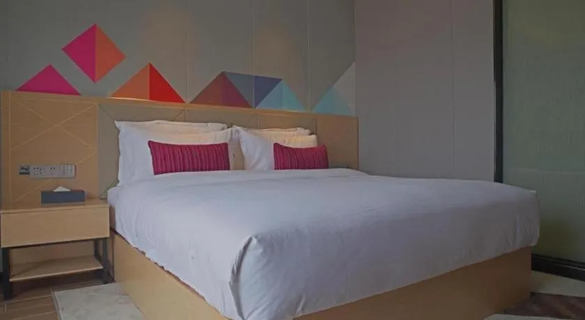 Bed in Borrman Hotel Zhaoqing Sihui Tianguangxu Jade City