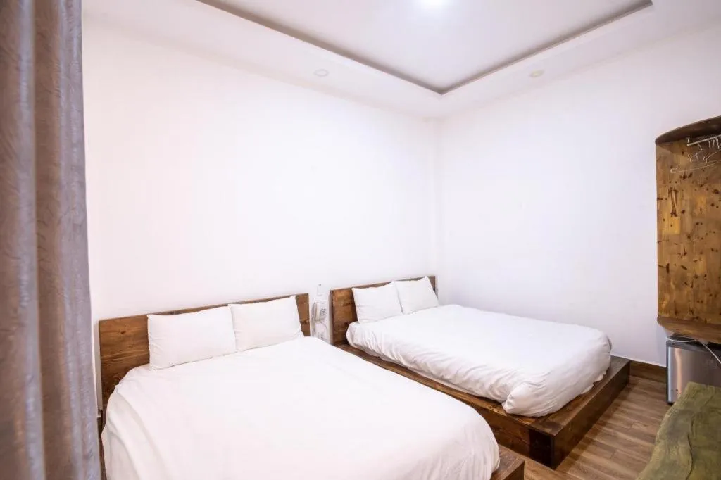 Bed in Nguyen Dang Hotel