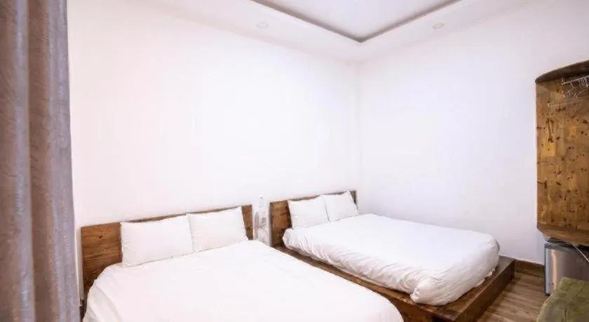 Bed in Nguyen Dang Hotel