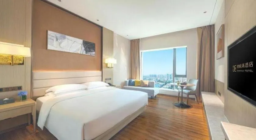 Bed in Derayco Hotel Foshan