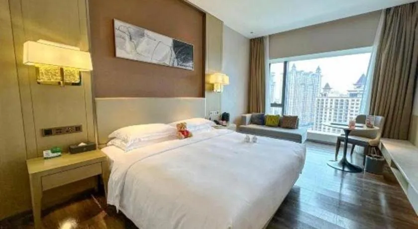 Bed in Derayco Hotel Foshan