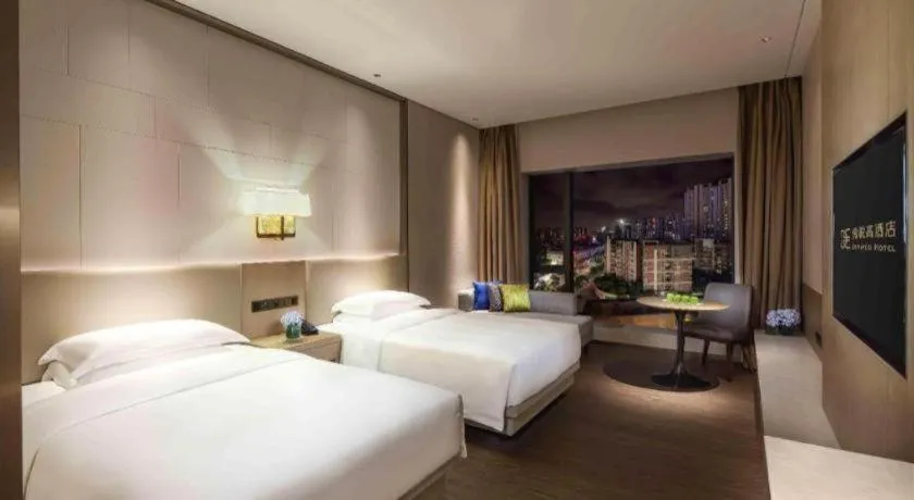 Bed in Derayco Hotel Foshan