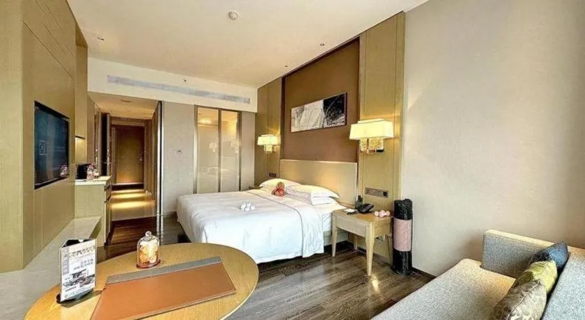 Bed in Derayco Hotel Foshan