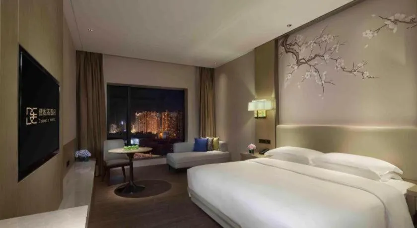 Bed in Derayco Hotel Foshan