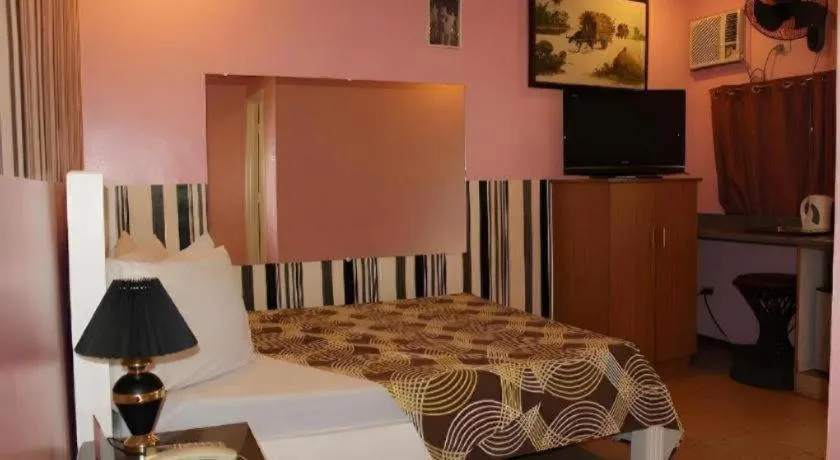 Bed in Walk Around Hotel