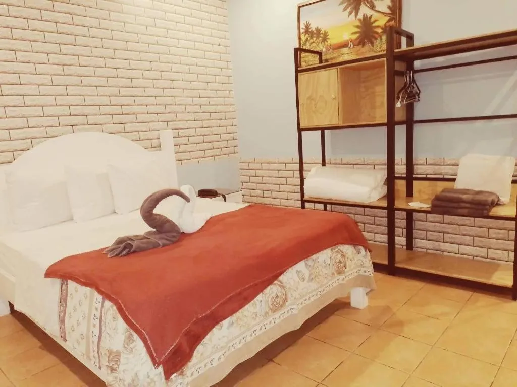 Bed in Walk Around Hotel