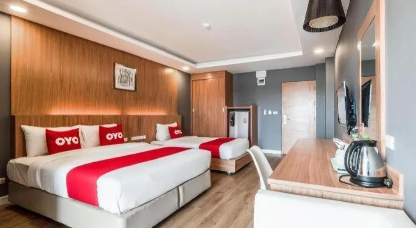 Bed in OYO 1126 Curve Boutique Pattaya