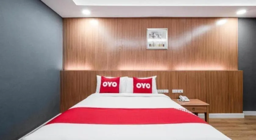 Bed in OYO 1126 Curve Boutique Pattaya