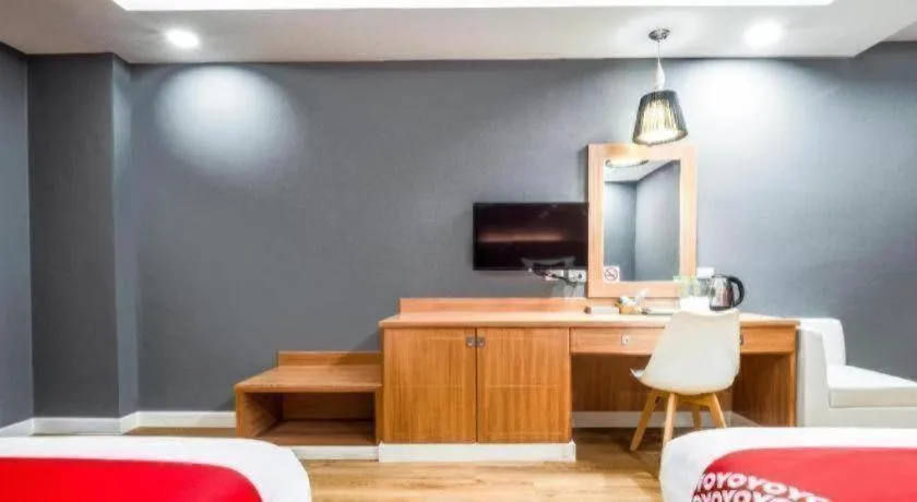 Bed in OYO 1126 Curve Boutique Pattaya