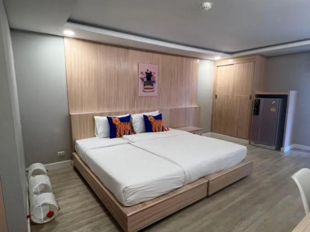 Bed in OYO 1126 Curve Boutique Pattaya