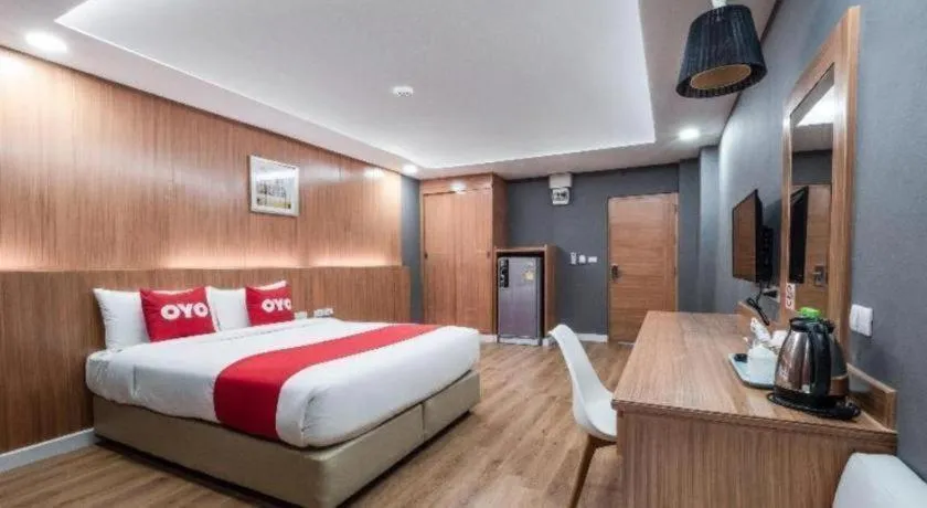 Bed in OYO 1126 Curve Boutique Pattaya
