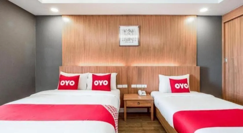 Bed in OYO 1126 Curve Boutique Pattaya