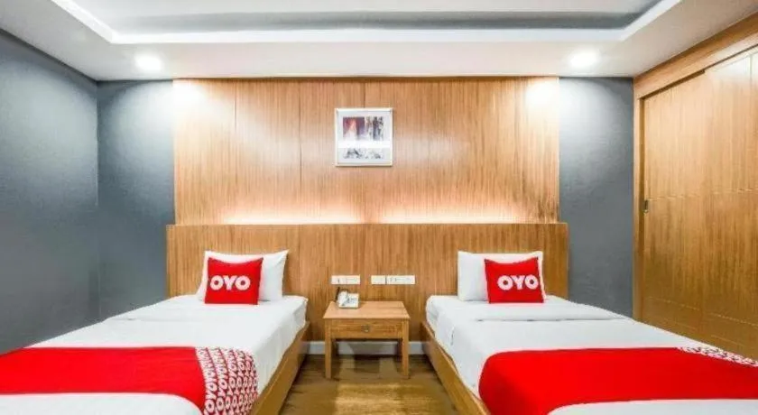 Bed in OYO 1126 Curve Boutique Pattaya