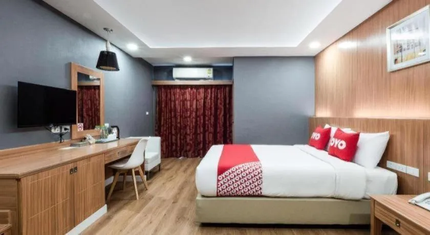 Bed in OYO 1126 Curve Boutique Pattaya