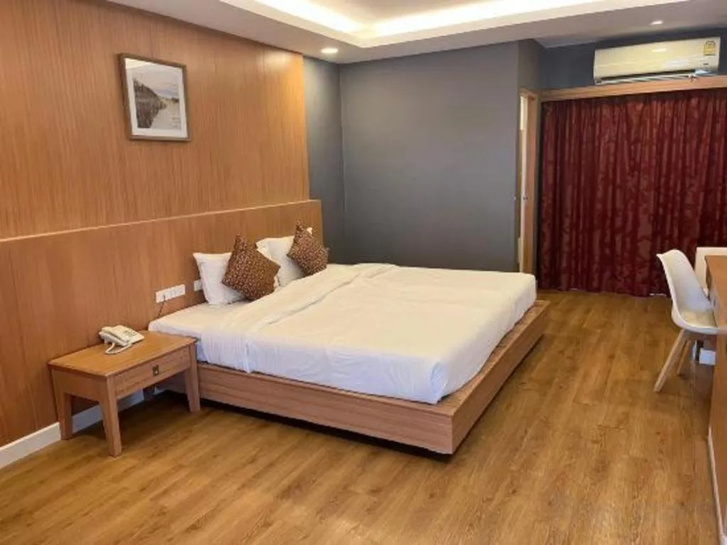 Bed in OYO 1126 Curve Boutique Pattaya