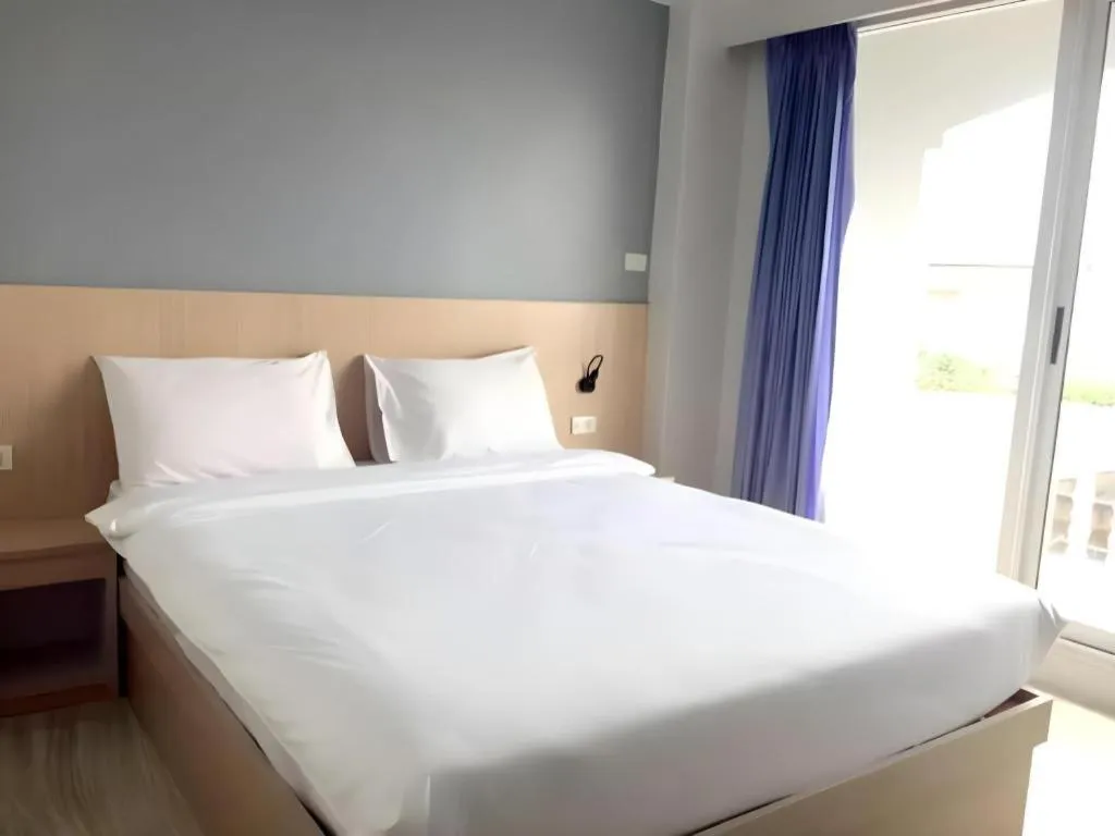 Bed in Grand PL Hotel