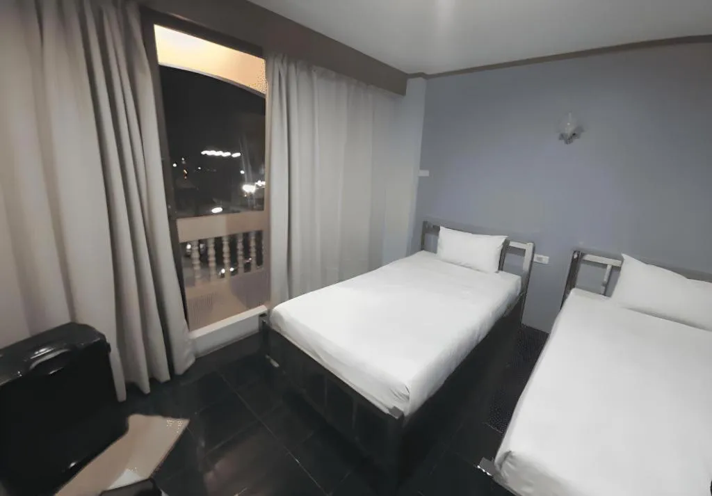 Bed in Grand PL Hotel