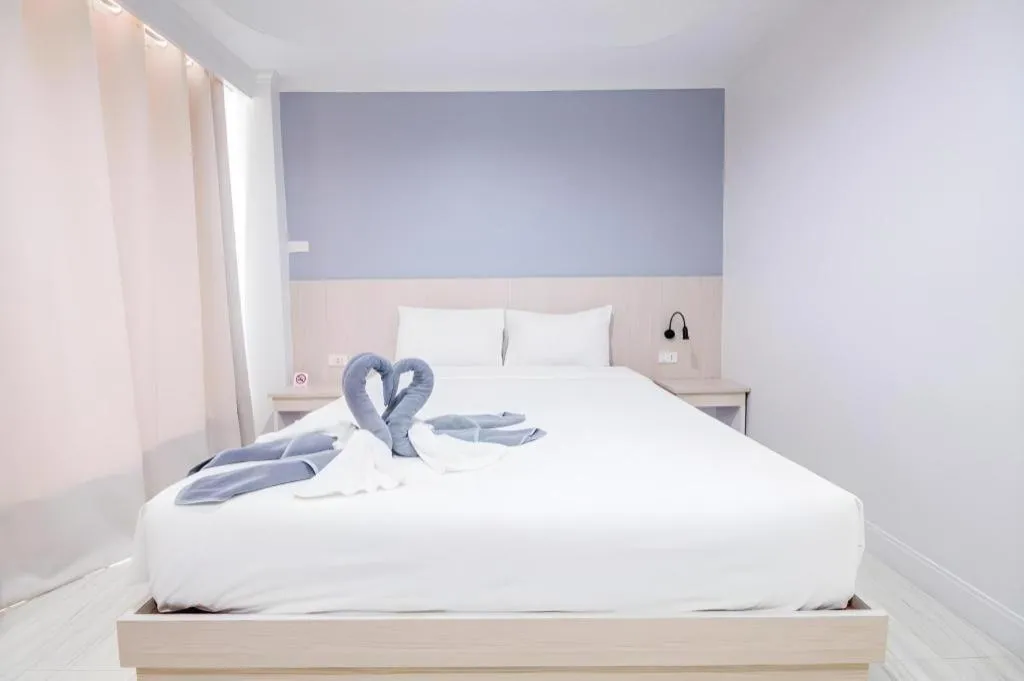 Bed in Grand PL Hotel