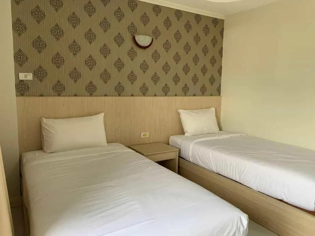 Bed in Grand PL Hotel