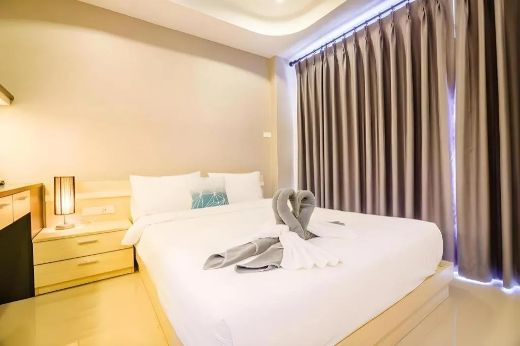 Bed in Grand PL Hotel